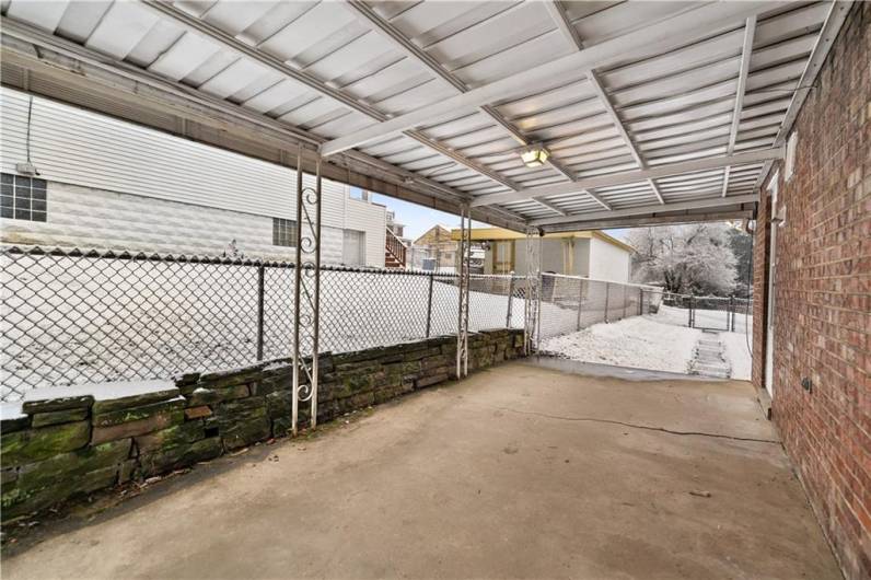 HUGE outdoor covered patio!!! Bring your grill and get ready for fabulous summer time hang outs!  Enjoy your morning coffee even if it is raining outside.  this cozy area will have you smiling!