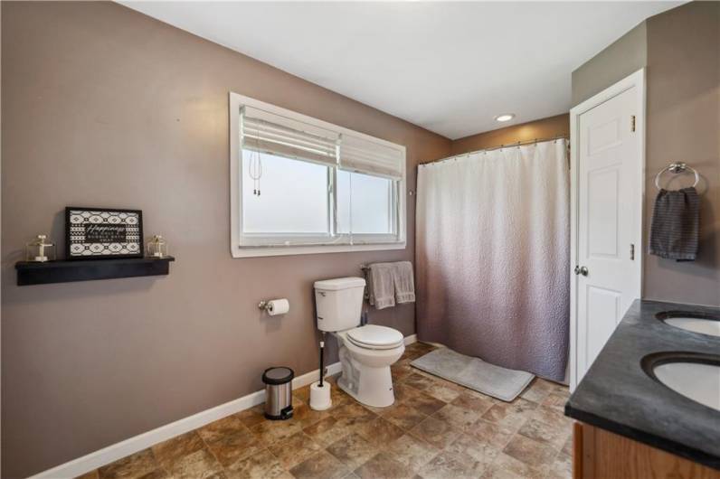 Spacious Bathroom w/ Double Sinks on Main Floor