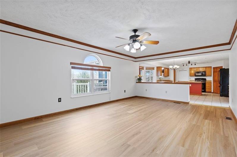 Open concept Family room leading to the kitchen