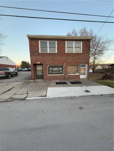 Front of building. Store front entrance.