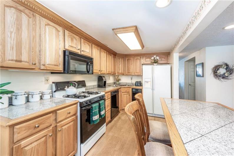 The home comes with all kitchen appliances, including a trash compactor.  That comes in very handy with the new trash cans!