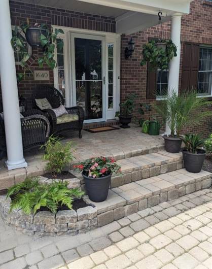 You'll enjoy the peace and tranquility of the stone front porch.