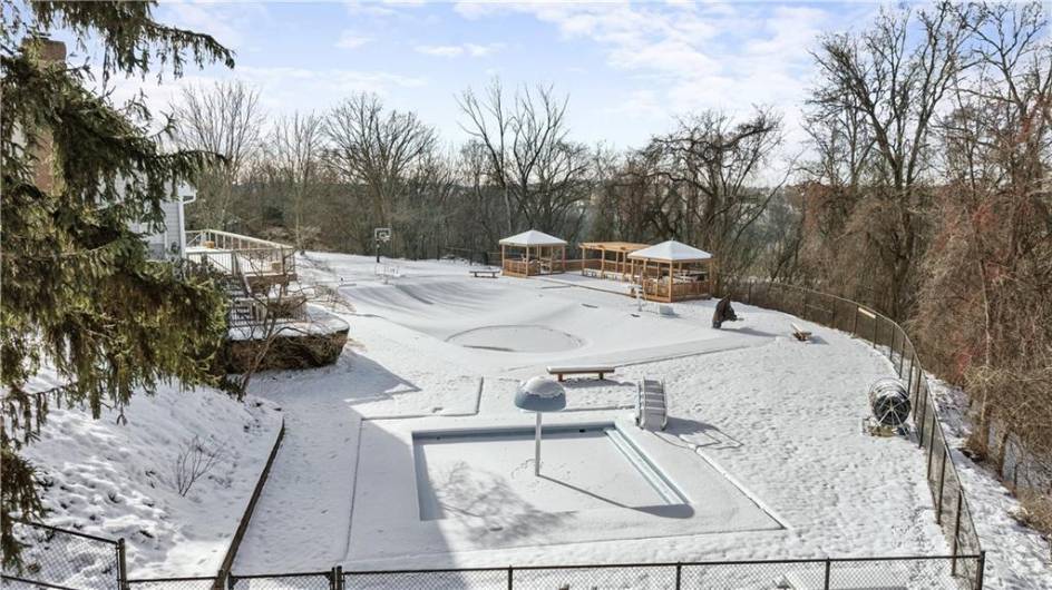 View of the Olympic size swimming pool and baby pool.