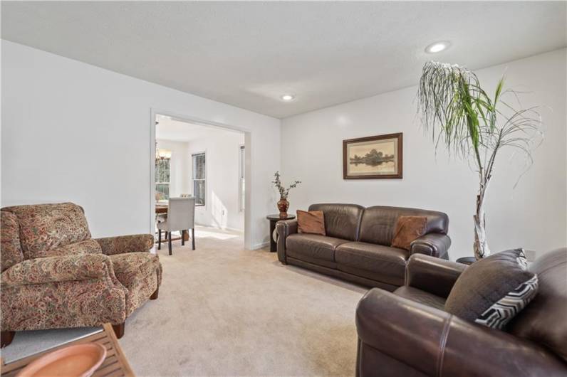 As you enter the house the inviting living room is to the right of the front hallway.