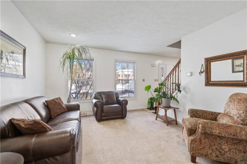 Relax in this cozy and comfortable space which can also serve as a music room, home office or playroom.