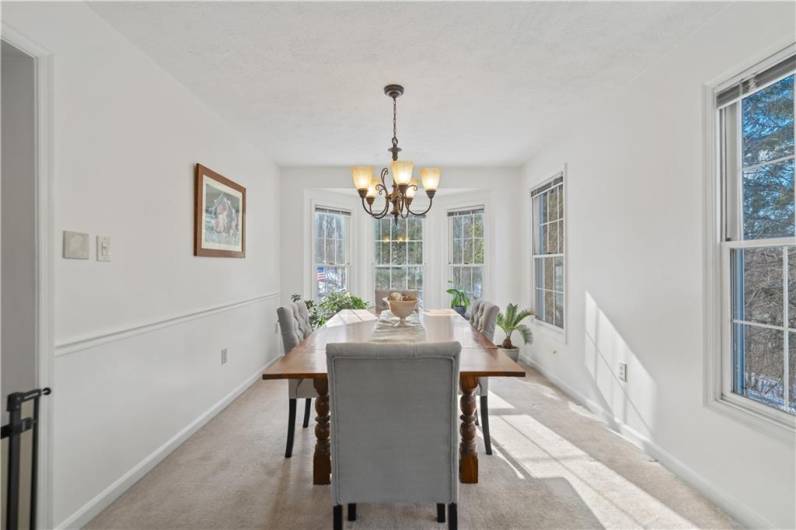 The dining room is flooded with natural light.