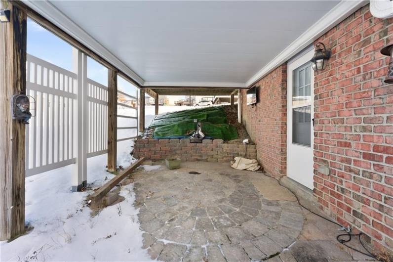 The outdoor patio features custom pavers and is waterproofed.  This is the perfect, private retreat for a hot tub!