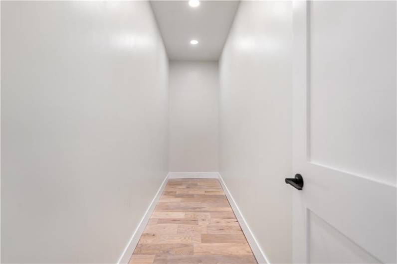 Wait.  What???  Is this the Primary Bedroom walk-in closet?   You bet it is!  Is this enough room for you!?