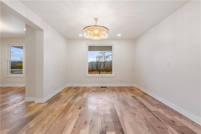 The dining space could also be transitional and used as a magnificent home office or study.   With the original pocket doors separating the living space, you have privacy to work or read!