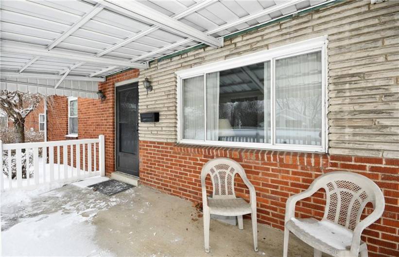 Fully fenced in front covered porch.