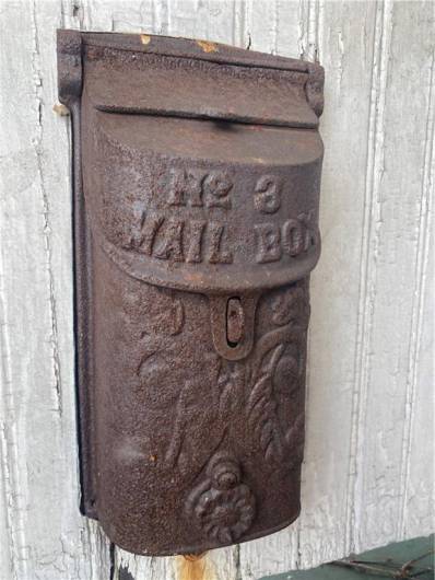 An antique mailbox goes right along with this handsome 1900 2 story home ...oh the stories it could tell.