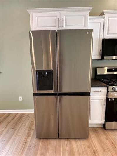 LG Stainless side by side refrigerator.