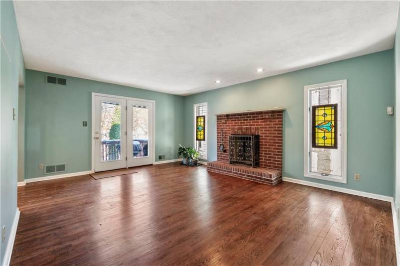 gas fireplace and walkout to the deck