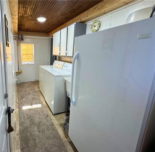 Main level laundry, easily accessible off the kitchen.