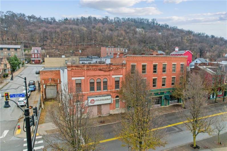 This is your opportunity to own THE MOST WELL KNOWN BUILDING in the heart of Pittsburgh's West End. Stretching almost 1/2 a city block, approx. 19,000 sq. ft., once home to the famous Village Tavern, 424 South Main Street is now ready to make your business/development dreams come true!