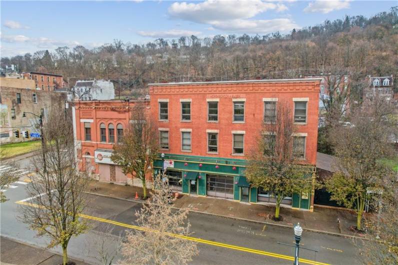 This is your opportunity to own THE MOST WELL KNOWN BUILDING in the heart of Pittsburgh's West End. Stretching almost 1/2 a city block, approx. 19,000 sq. ft., once home to the famous Village Tavern, 424 South Main Street is now ready to make your business/development dreams come true!