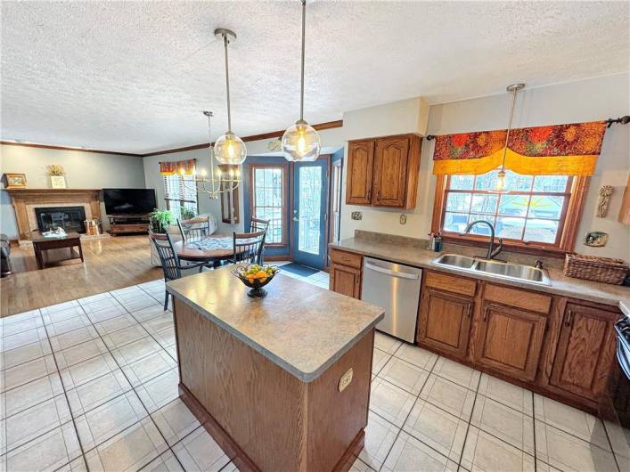 Open kitchen and family room is ideal for entertaining.