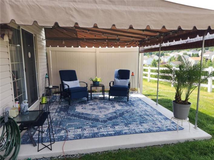 The covered patio is the perfect summertime retreat!