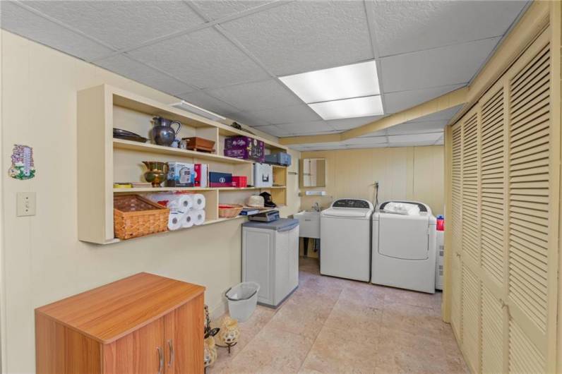 The lower level features a large Laundry/Utility/Storage Room plus several large closets for storage.