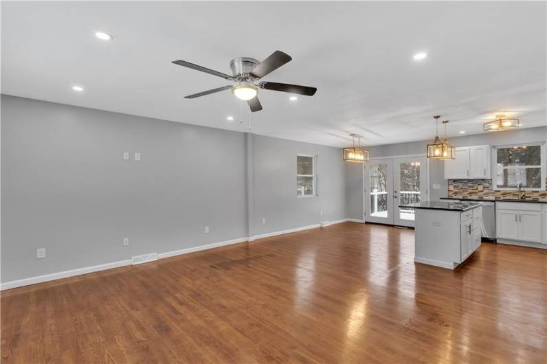 Beautifully Refinished Hardwood Floors Throughout the Main Level of the Home.