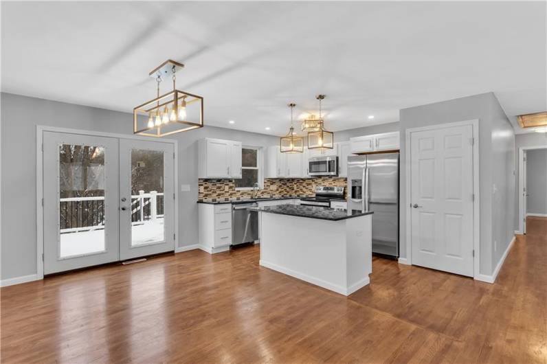 All New Light Fixtures and Beautiful Tile Backsplash in the Kitchen.