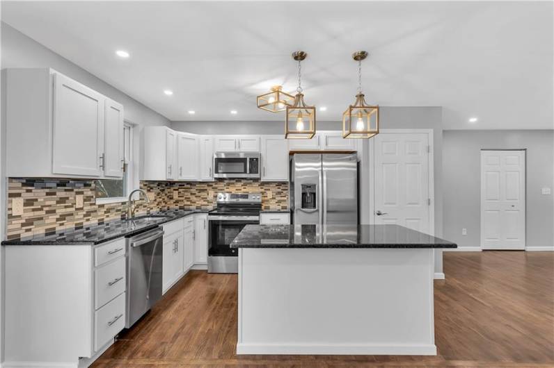 Brand New Kitchen Cabinets, Granite Counter Tops and All NEW Stainless Steel Appliances.