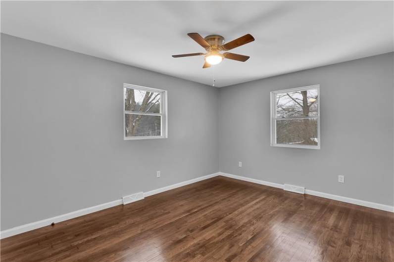 Second Bedroom With Ceiling Fan.