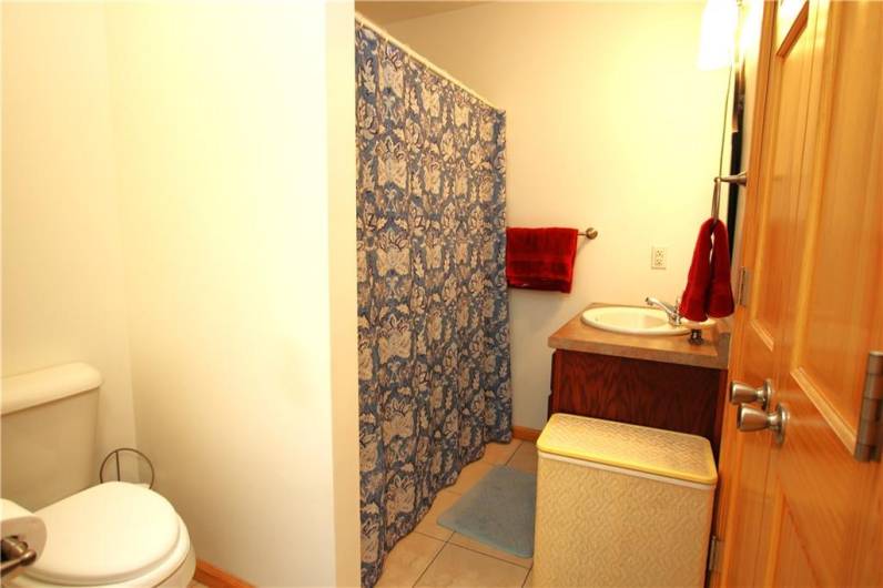 Convenient 1st Floor Full Bathroom w/ Ceramic Tile Floors, Beautiful Vanity & Attractive Lighting plus Deep Double Door Shelved Closet (in addition to another hallway linen closet)