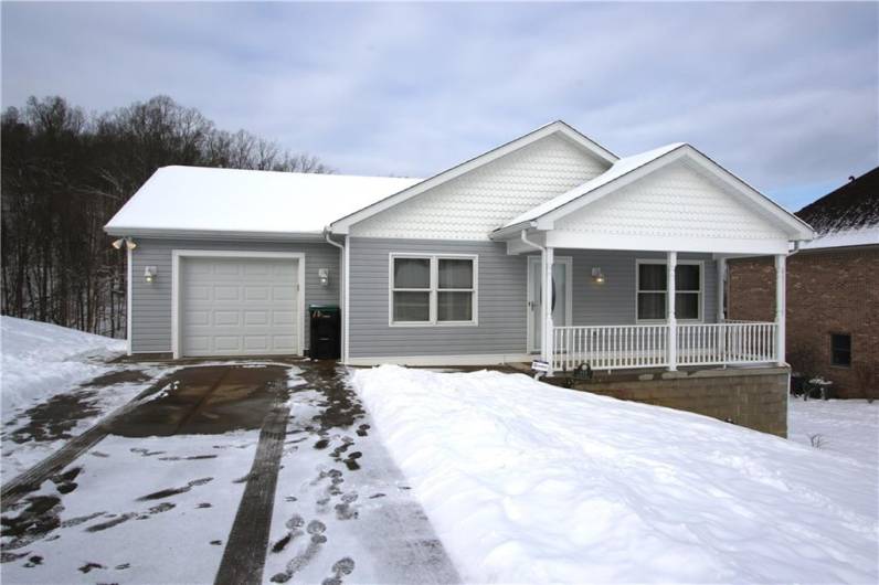 Level Living at its BEST!!! Easy Level Entry w/ Convenient Attached Garage & Wonderful 18x5 Covered Front Porch. Situated near end of small Development in Low Traffic area. Just off Route 88 and minutes to Shopping, Restaurants, Entertainment, Banking, Places of Worship, I-70 and so much more....