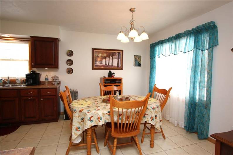 Another View of Sun-filled Eat-in Kitchen & great view of Gorgeous Ceramic Tiled Floors