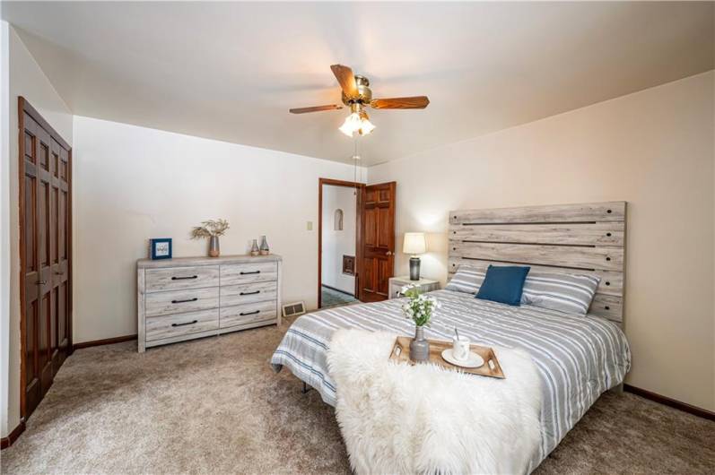 This spacious primary bedroom will accommodate all of your larger furniture needs.