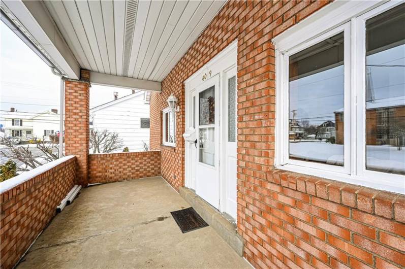 The 14 X 7 covered front porch provides a great area for relaxing with a beverage and some fun chit chat.