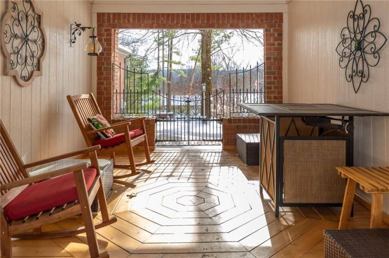 Interesting cedar flooring in this area.  A place to enjoy the views of each season!