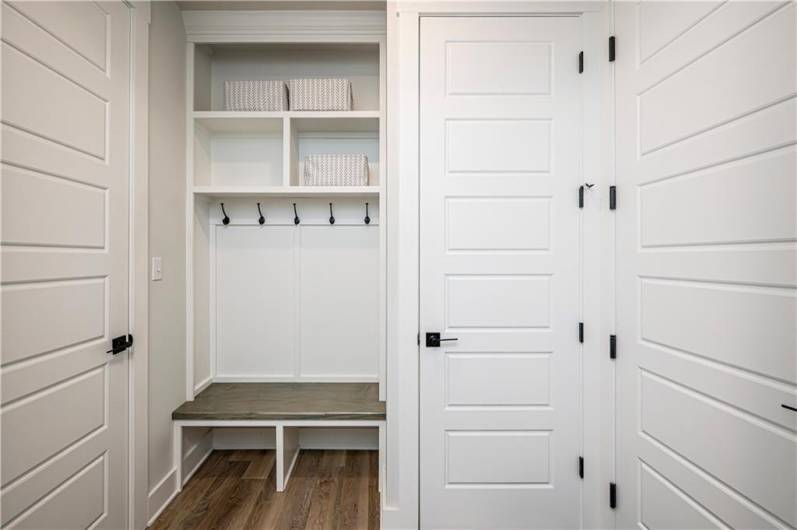 Coat Closet and Built-ins as you enter from garage.