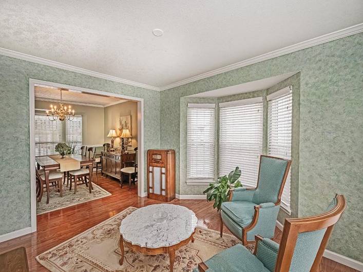 Sitting Room with view into the Formal Dining Room.