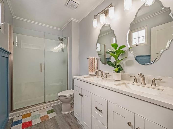 Fully Renovate Primary Full Bath! Features a walk-in shower.