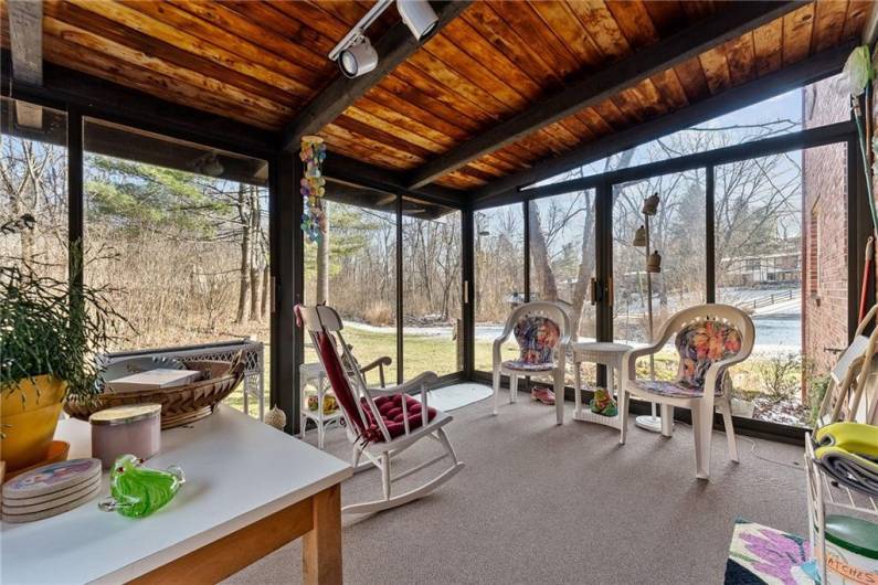 My favorite part of this beautiful home is this sun room, I love this space and the views