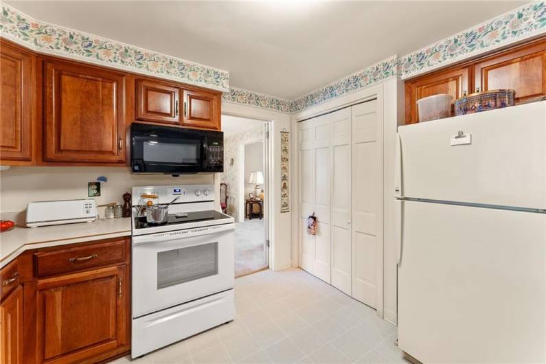 This kitchen has a very nice pantry and you can also see access to the formal dining room.