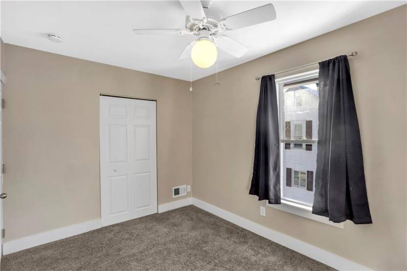 The 2nd bedroom also exudes a neutral space - so easy to decorate!