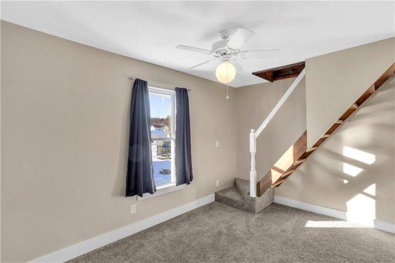 The 3rd bedroom is right up those stairs - so private!