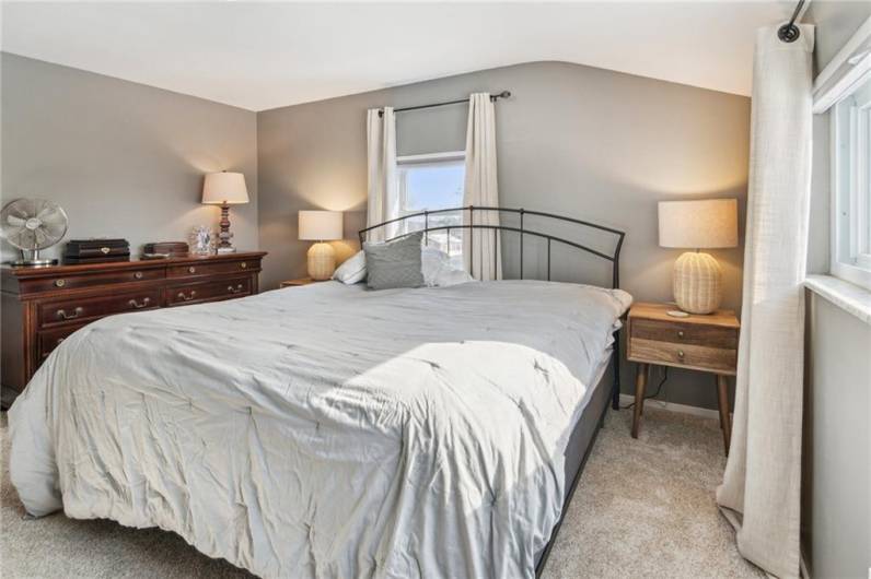 Another view of the spacious master bedroom with tons of natural light