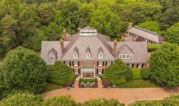 Situated on 3.14 acres in Timber Creek Farms.