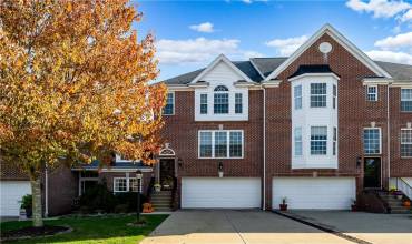 Front View of Kaclik built townhome in Heritage Creek