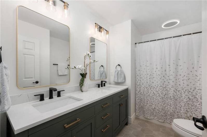 Stunning, new Hall Bathroom w/ dual sinks and high-end tile floor