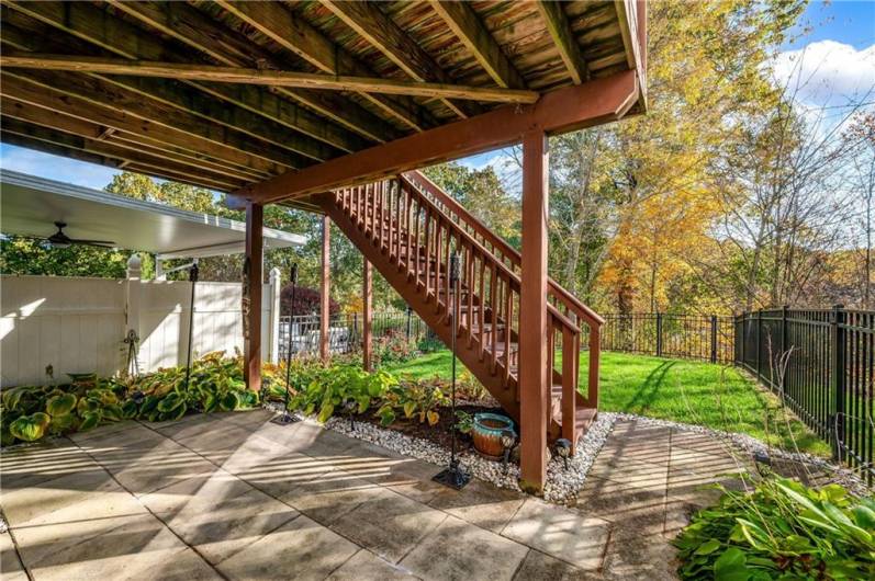 paver patio, deck and fenced-in yard