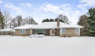 Stunning quality built stone ranch home.