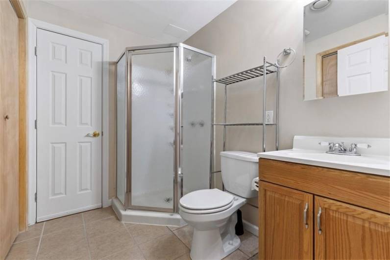 Added convenience with a full bathroom in the lower level, making entertaining and relaxation even easier