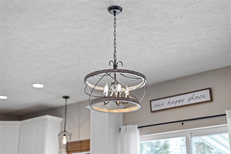 Stylish light fixture that brightens the room and sets the tone for your one happy place.