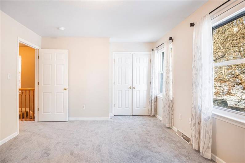 Primary Bedroom with new carpet.