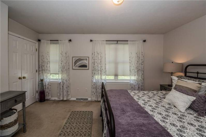 Primary bedroom, furnished, before replacing carpet.